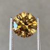 3.62 Ct Fancy Intense Yellow Brown / SI2 Round Diamond
